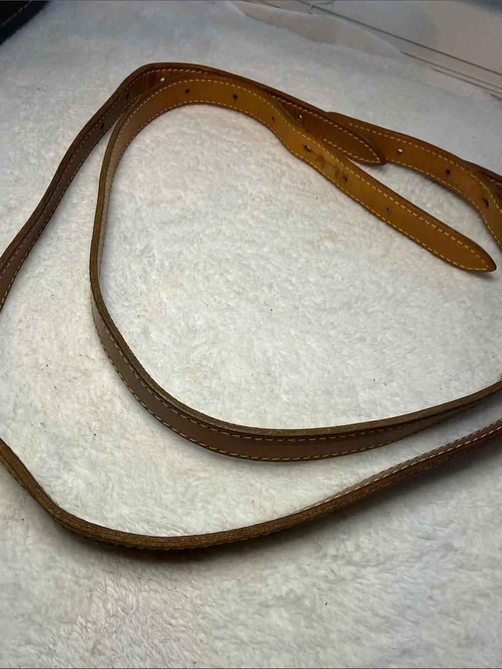 1 set of Louis Vuitton leather straps